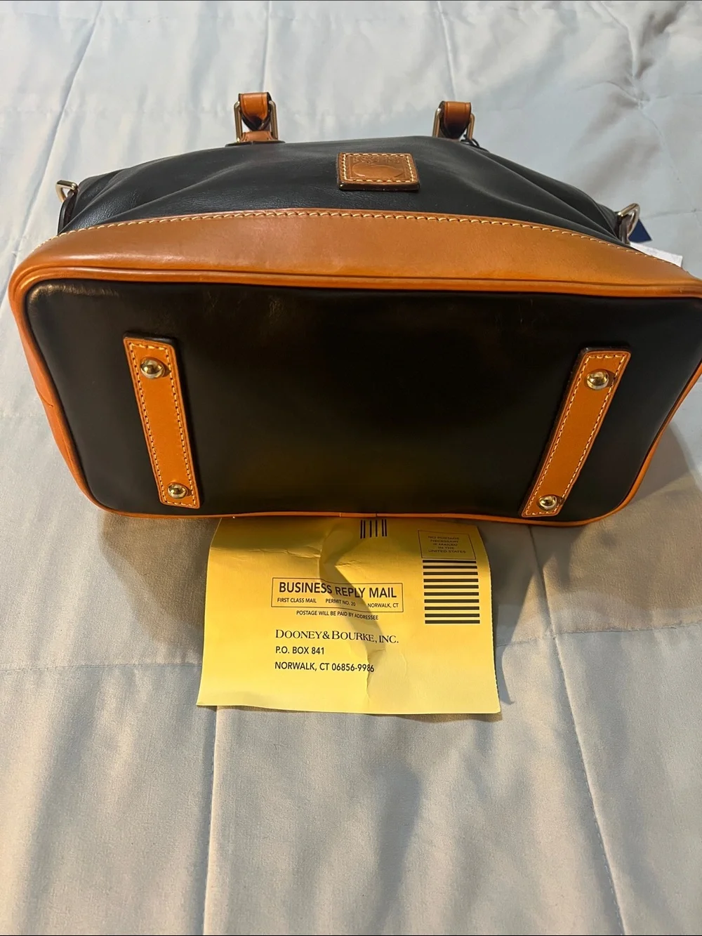 Dooney & Bourke Beige Canvas Messenger Bag with Tan Leather Trim